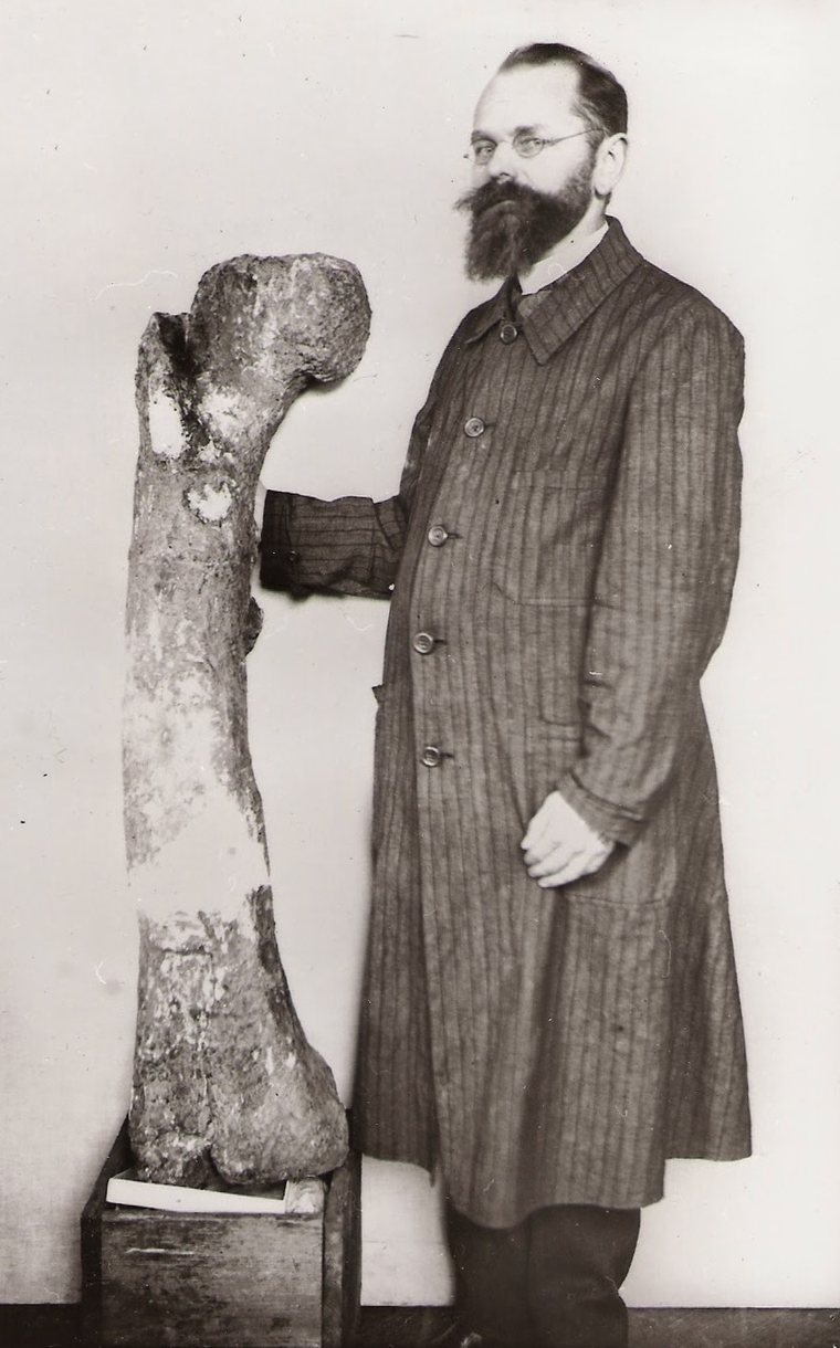 Ernst Stromer beside a fossil bone